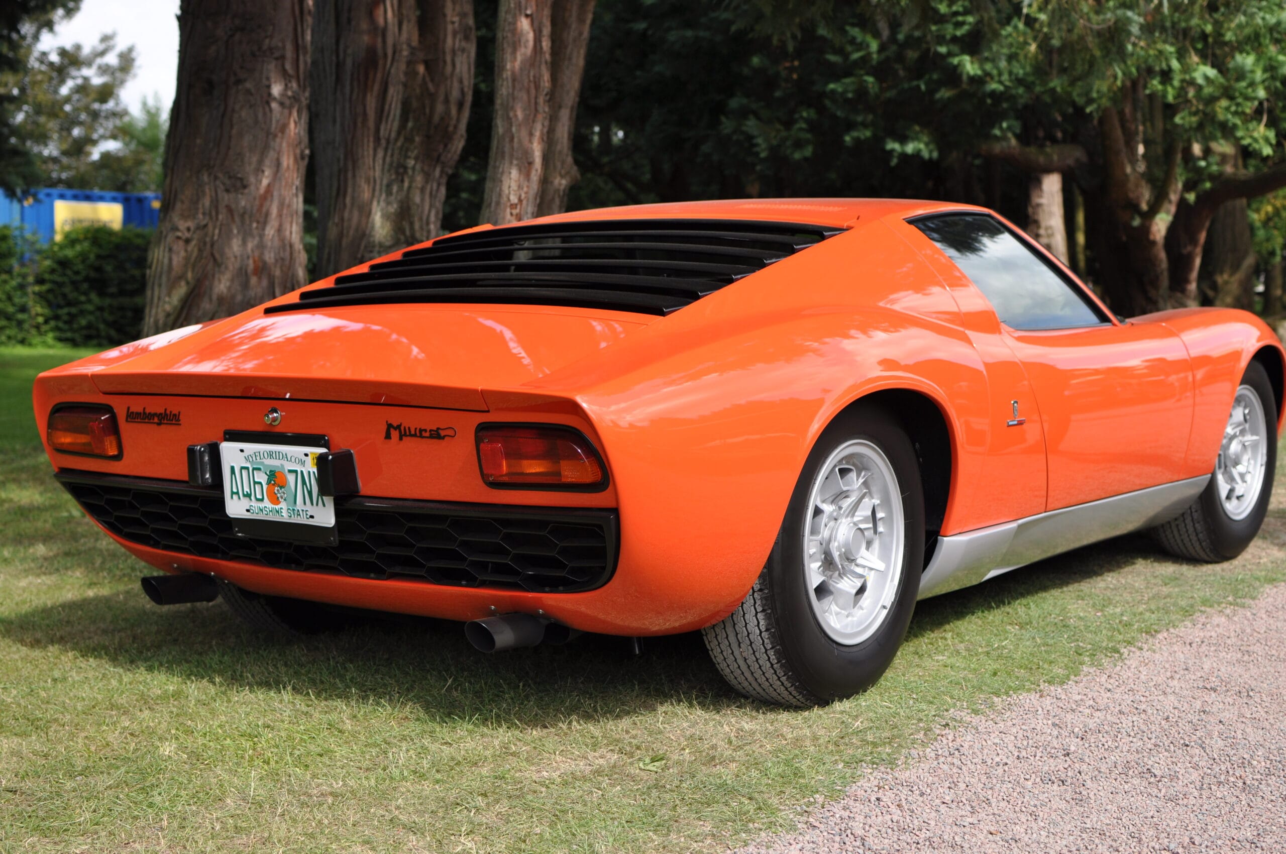 Orange colored Lamborghini Miura from right hand back