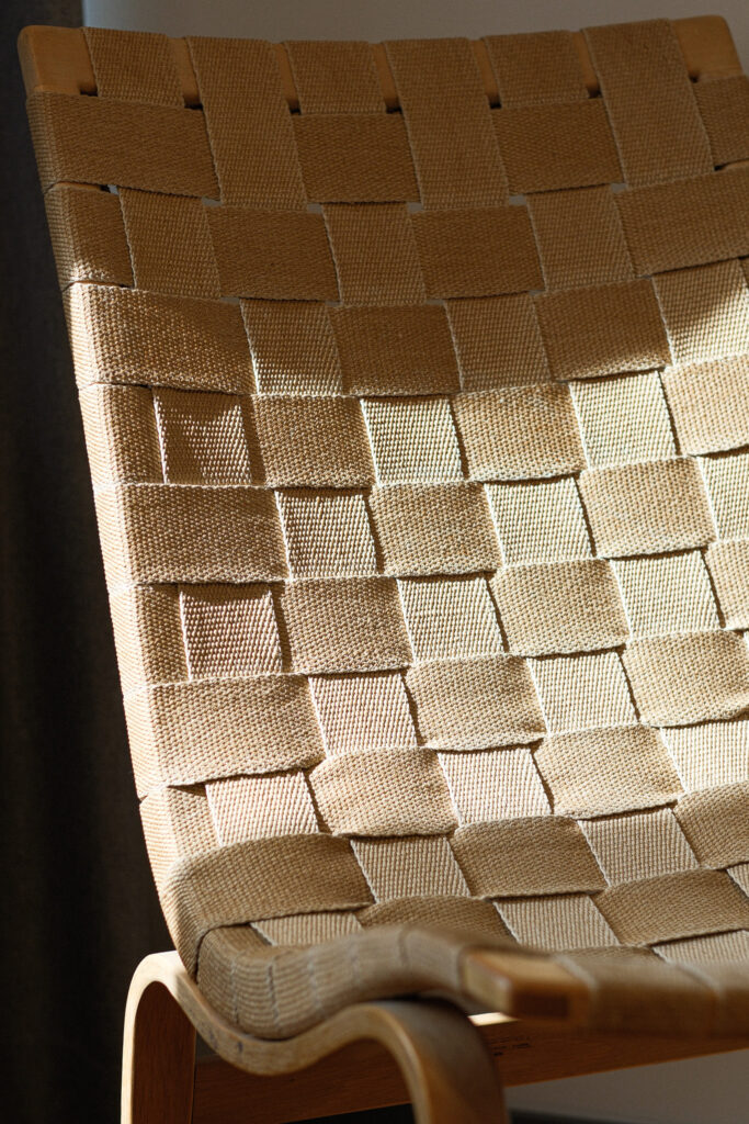 Bruno Mathsson woven chair Eva with curved wood frame and webbed seat